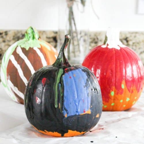 kid painted pumpkin