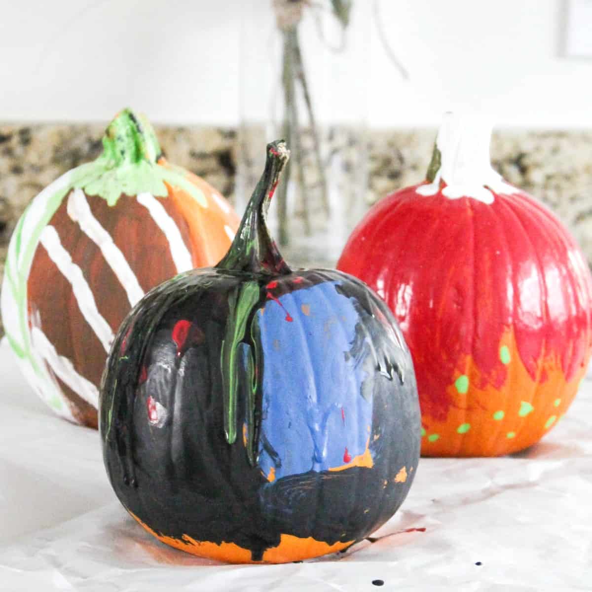 kid painted pumpkin